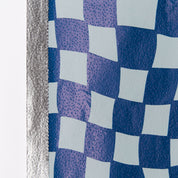 Close-up of Denim Check foil pattern and silver edge