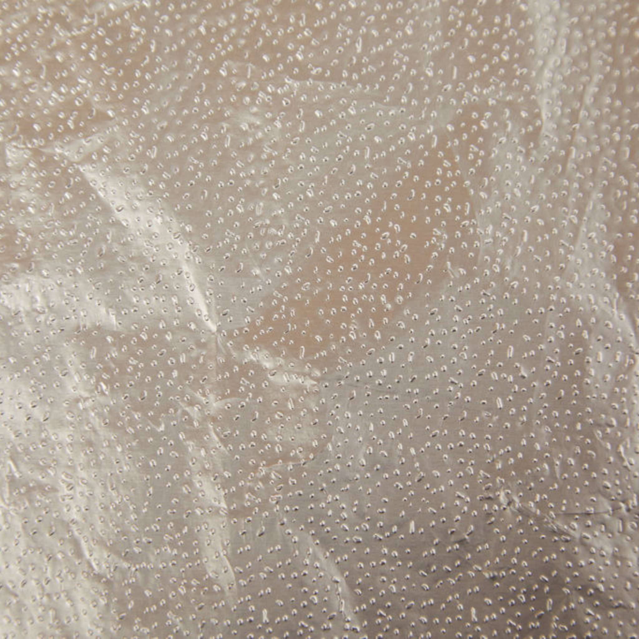 Silver dotted back side of the foil, close-up